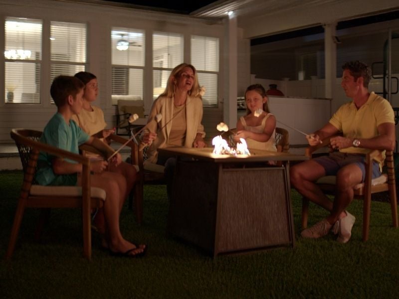 Family having smores in backyard