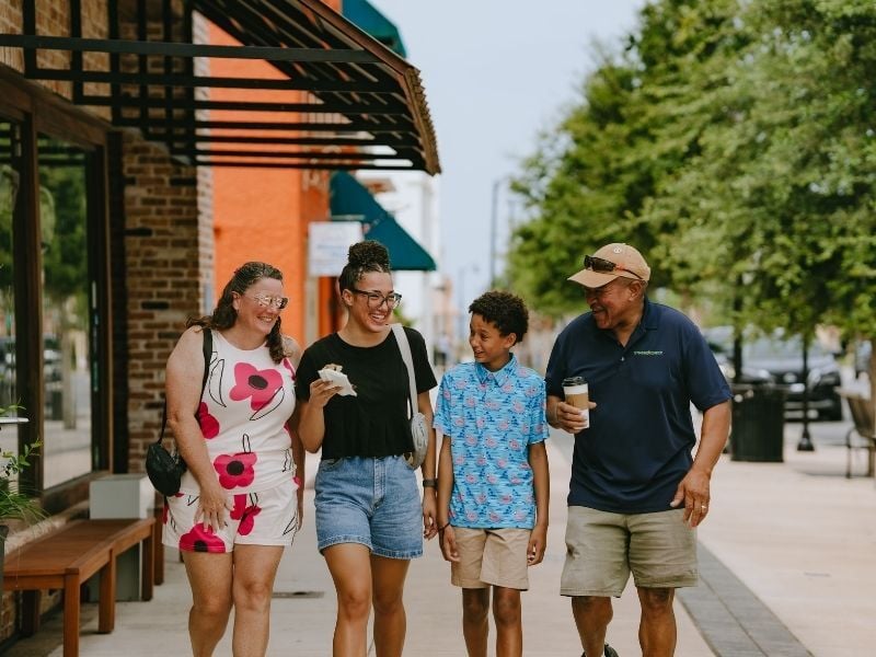 Family walking downtown
