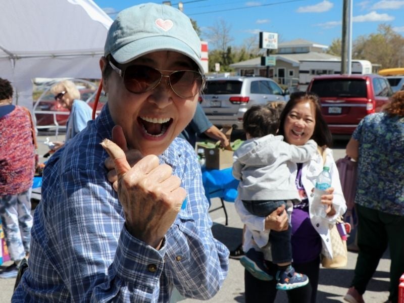Happy member with thumbs up