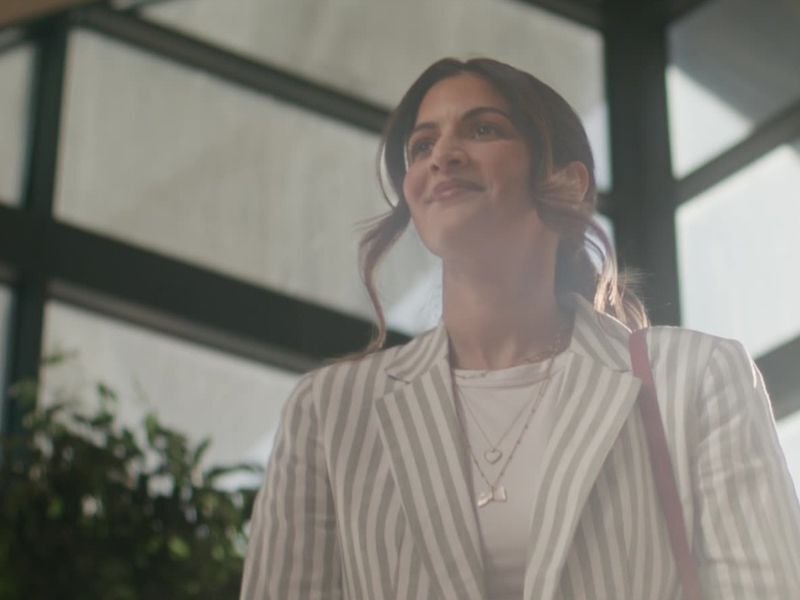 Happy woman in lobby