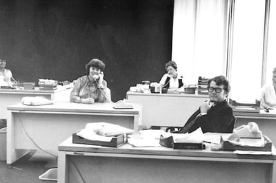 Historical photo of employees on the phones