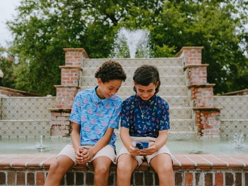 Kids hanging out on phone
