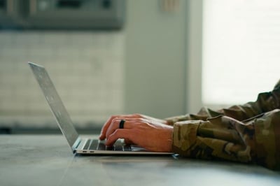 Military person on laptop